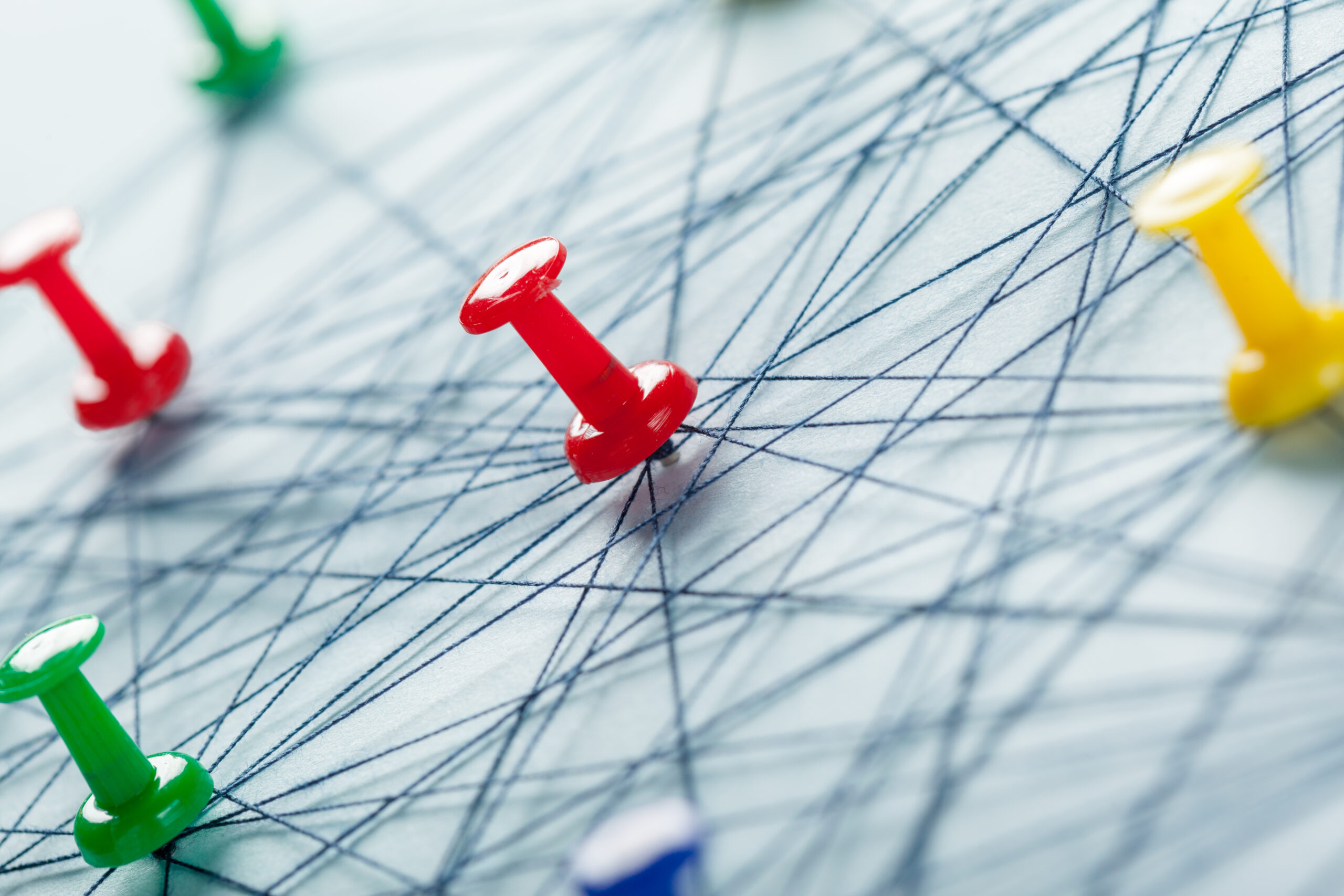 Network of connected pins — a metaphor for team alignment